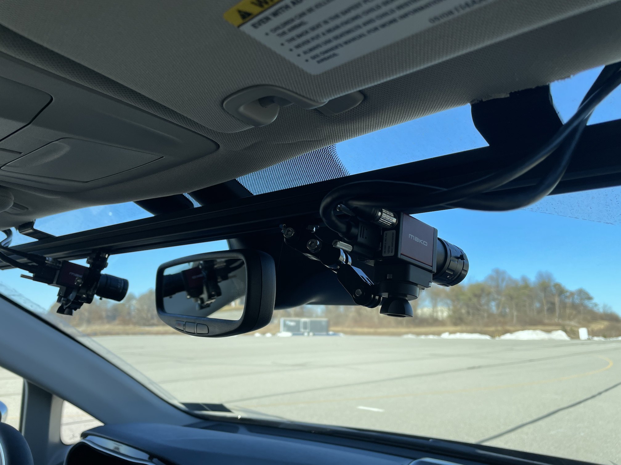 Forward camera mounted behind the windshield
